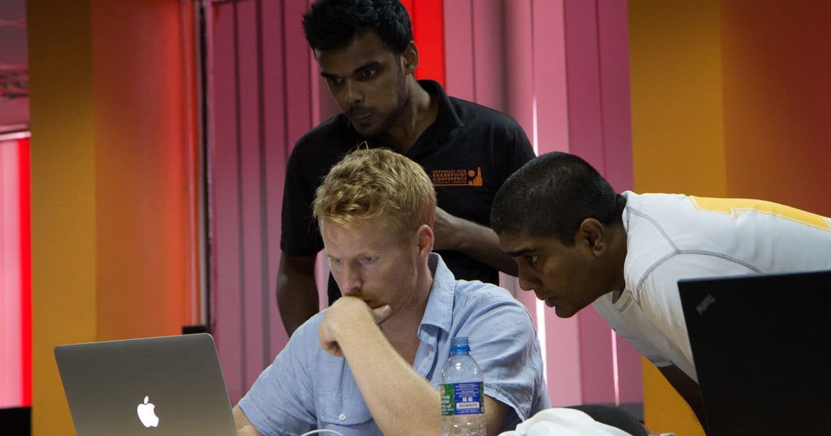 Mads Nissen coding with Puzzlepart's Sri Lankan team at the Southeast Asia SharePoint Conference, Colombo 2012