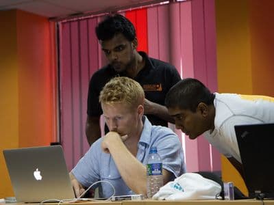 Mads Nissen coding with Puzzlepart's Sri Lankan team at the Southeast Asia SharePoint Conference, Colombo 2012
