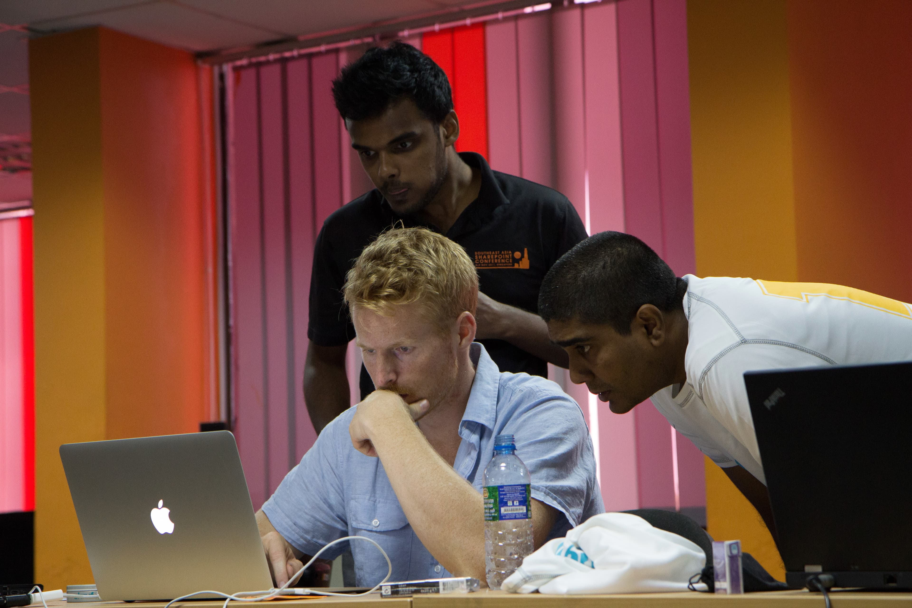 Mads Nissen coding with Puzzlepart's Sri Lankan team at the Southeast Asia SharePoint Conference, Colombo 2012